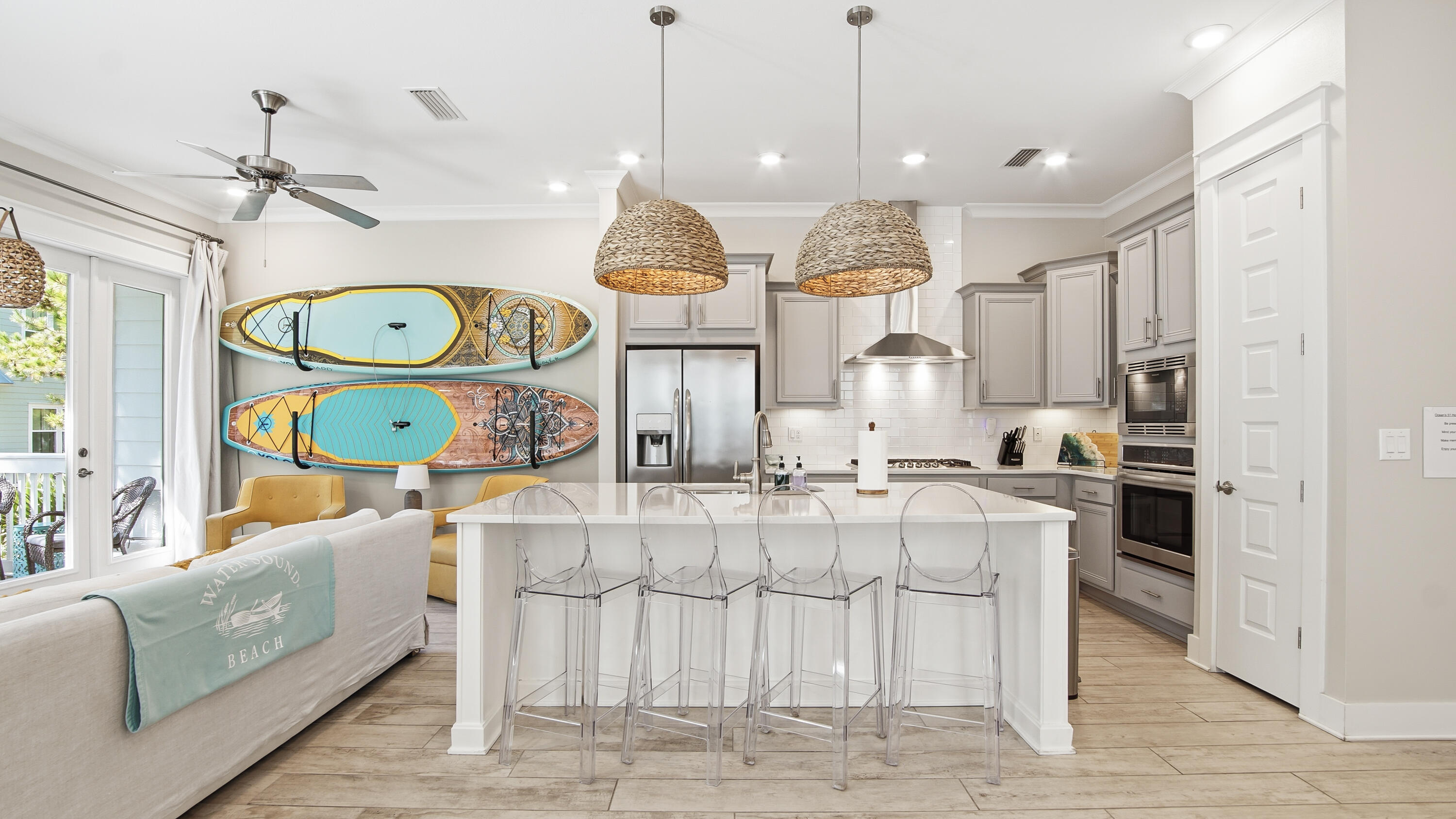 51 Dune Comet Lane, Unit A Inlet Beach, FL 32461 - Photo 4 of 41 a large kitchen with a table and a clock