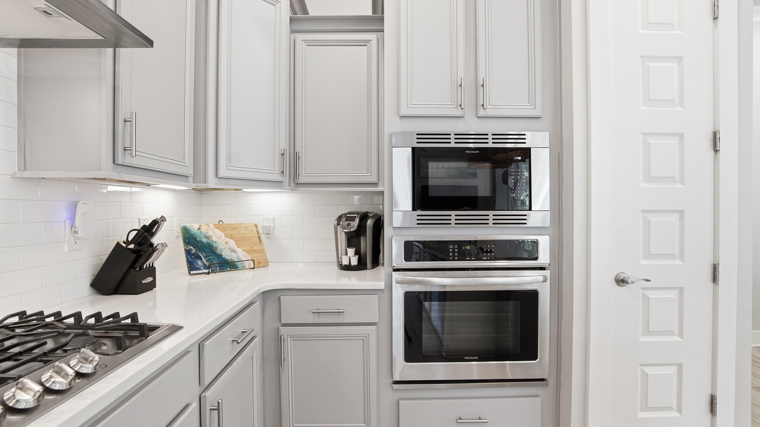 51 Dune Comet Lane, Unit A Inlet Beach, FL 32461 - Photo 8 of 41 a kitchen with cabinets and appliances