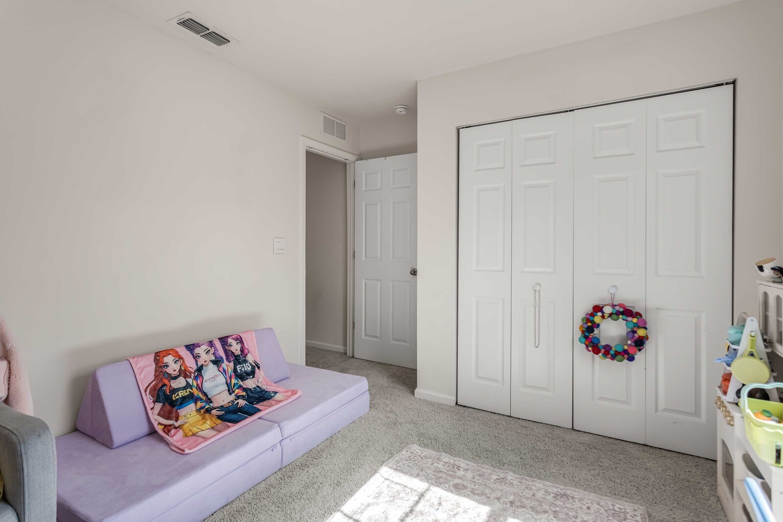 86784 Mainline Road Yulee, FL 32097 - Photo 17 of 25 a living room with furniture and painting on the wall