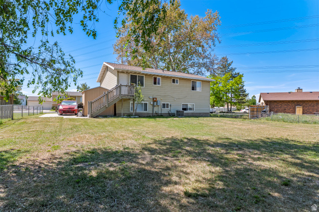 2402 710 North Provo, UT 84601 - Photo 15 of 15 Expansive rear yard featuring natural grass and mature trees