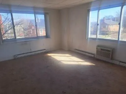 an empty room with windows