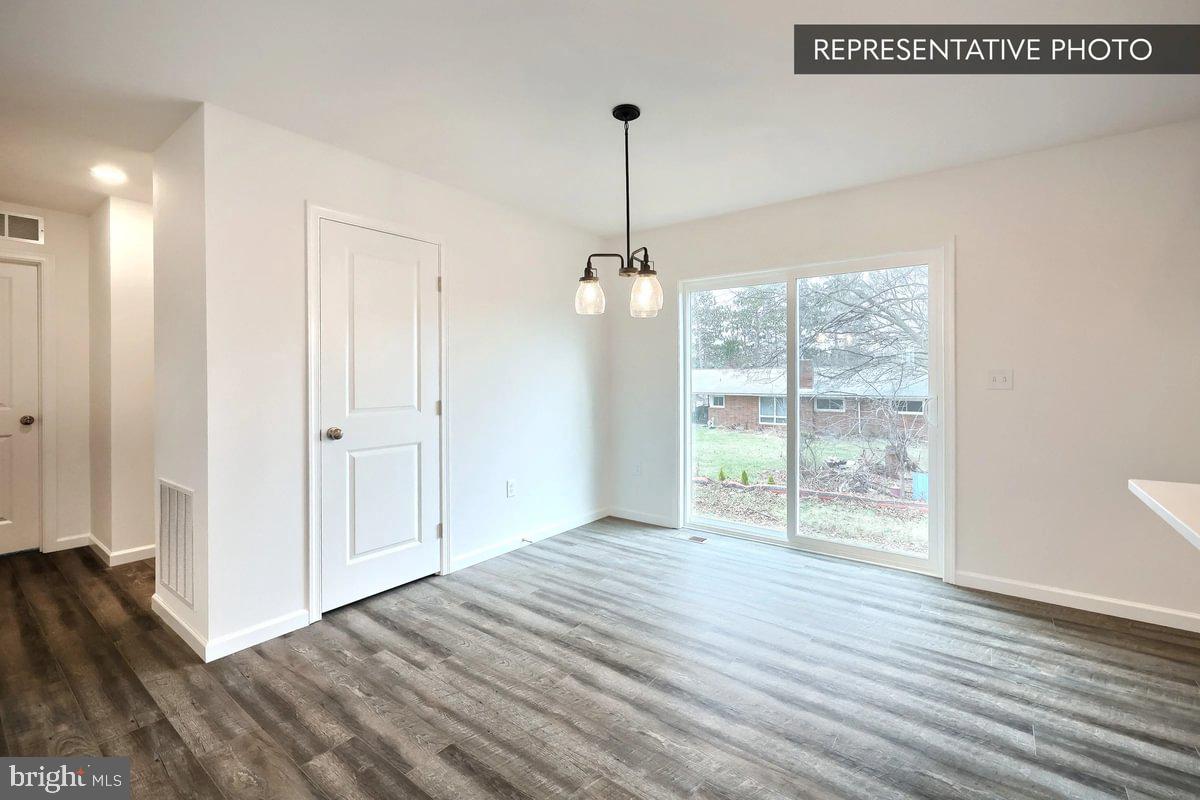 Pin Oak 5br Plan At Hills Spring Grove, PA 17362 - Photo 15 of 38 a view of hallway with wooden floor and window
