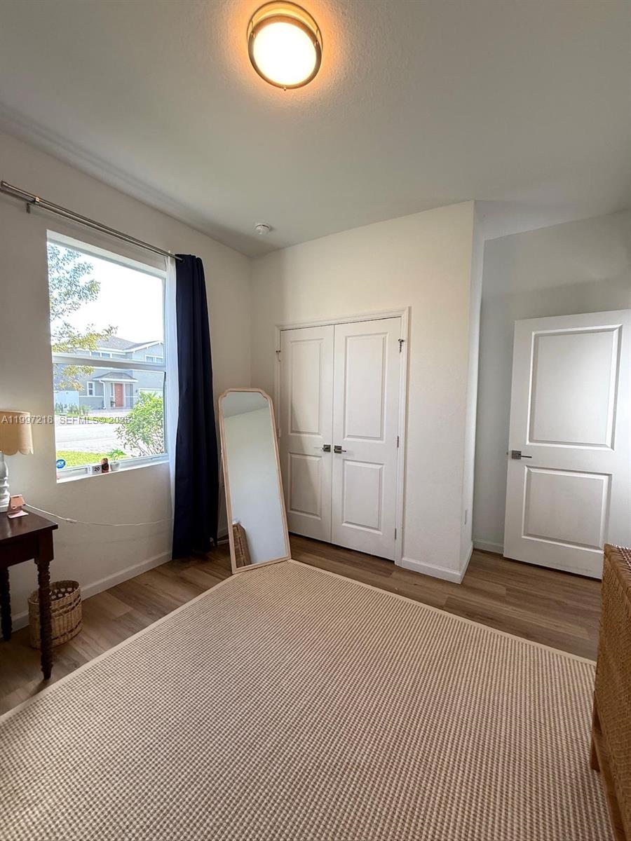 13233 Southwest 272nd Street Homestead, FL 33032 - Photo 18 of 21 a view of a livingroom with a staircase