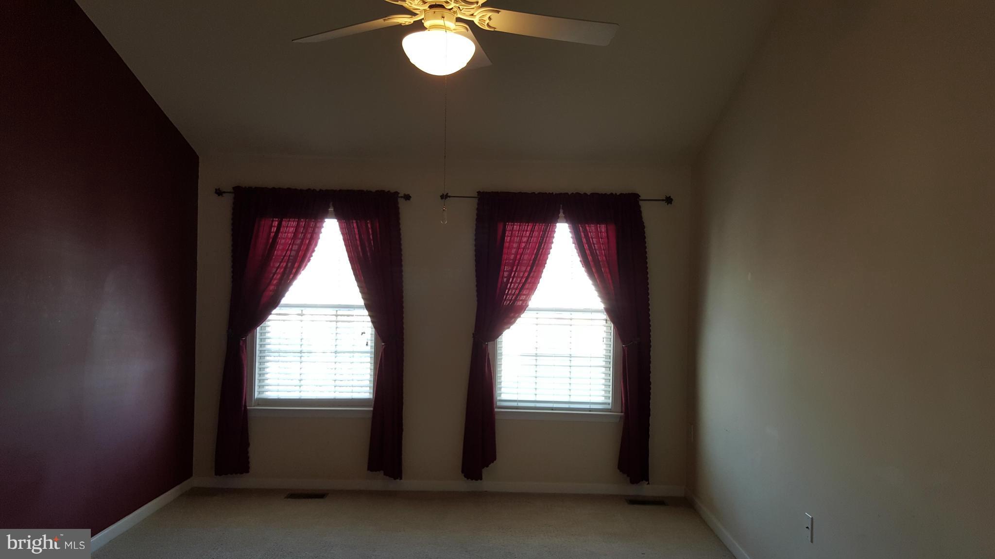 102 Limited Drive Ranson, WV 25438 - Photo 15 of 23 an empty room with windows
