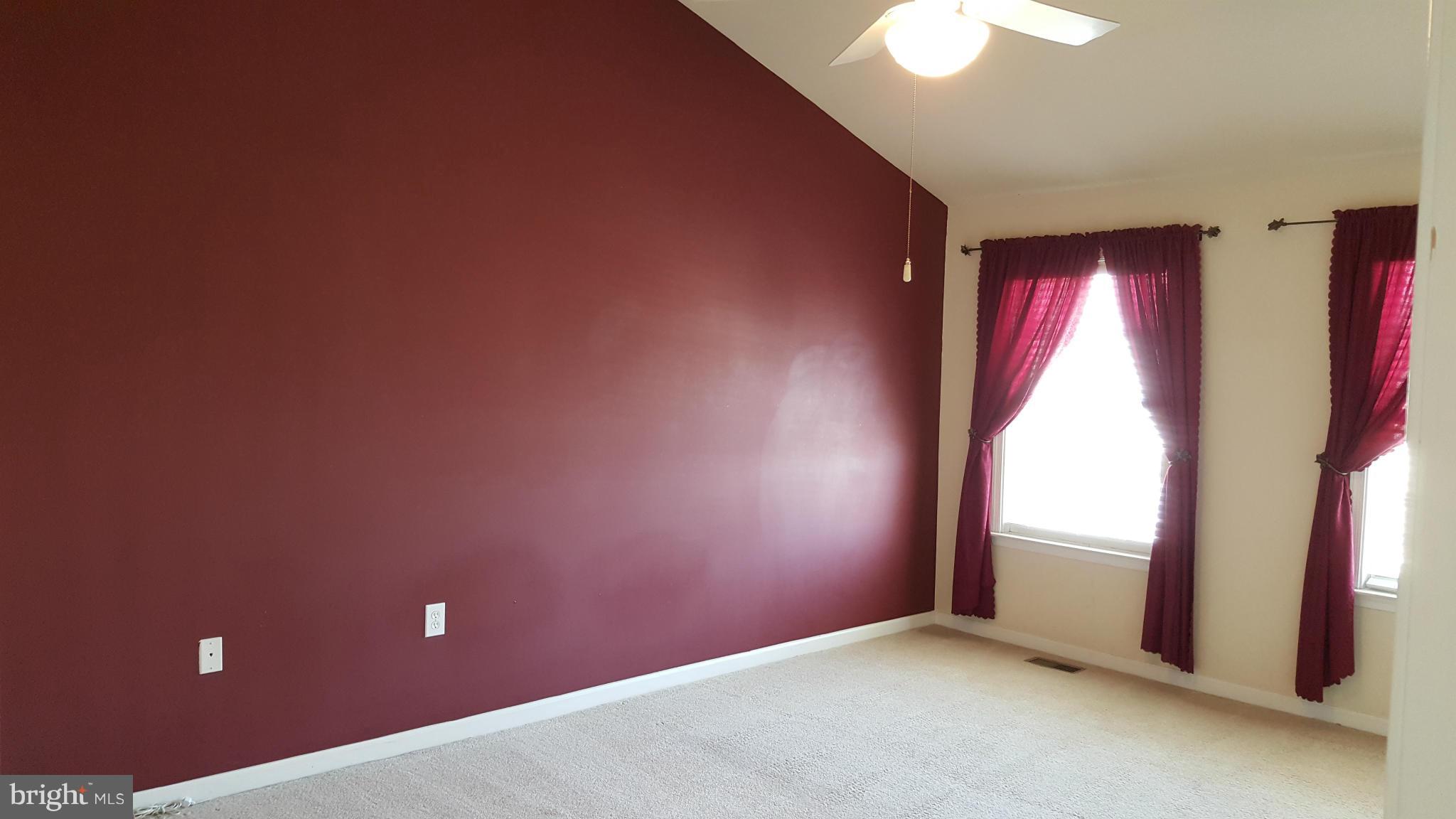 102 Limited Drive Ranson, WV 25438 - Photo 16 of 23 an empty room with windows and closet