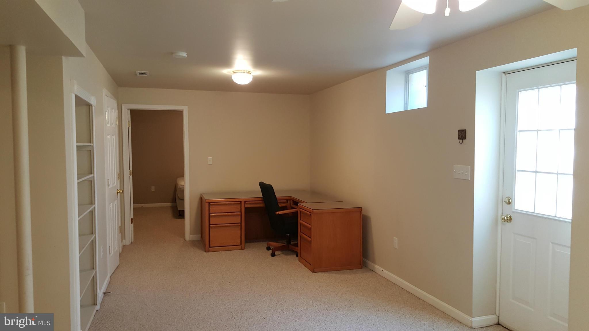 102 Limited Drive Ranson, WV 25438 - Photo 20 of 23 a room with furniture and windows