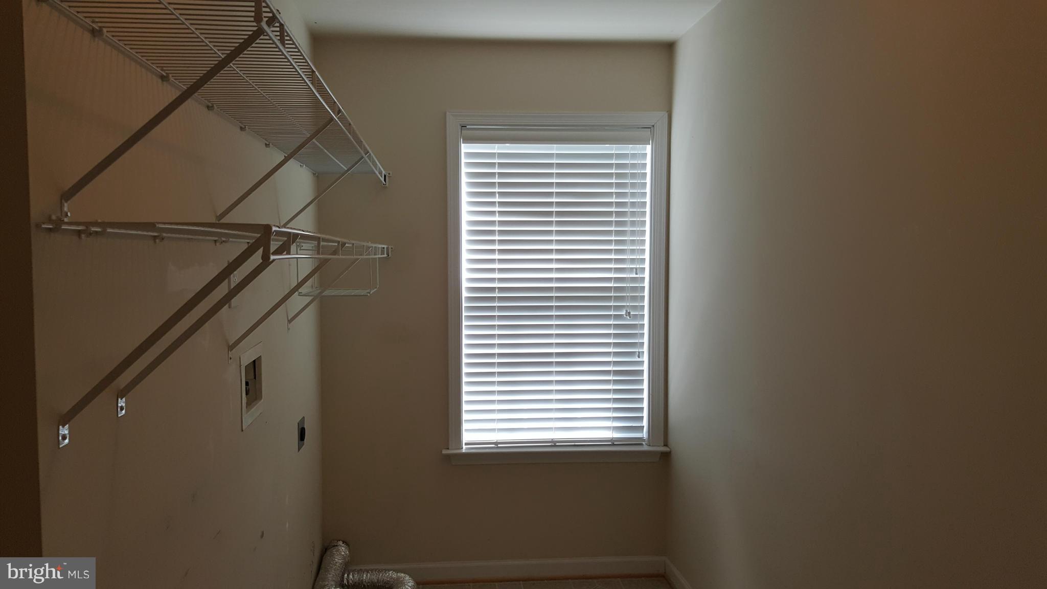 102 Limited Drive Ranson, WV 25438 - Photo 23 of 23 a view of a window in an empty room