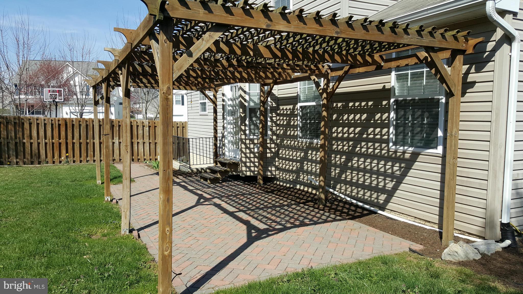 102 Limited Drive Ranson, WV 25438 - Photo 4 of 23 a view of a backyard with sitting area