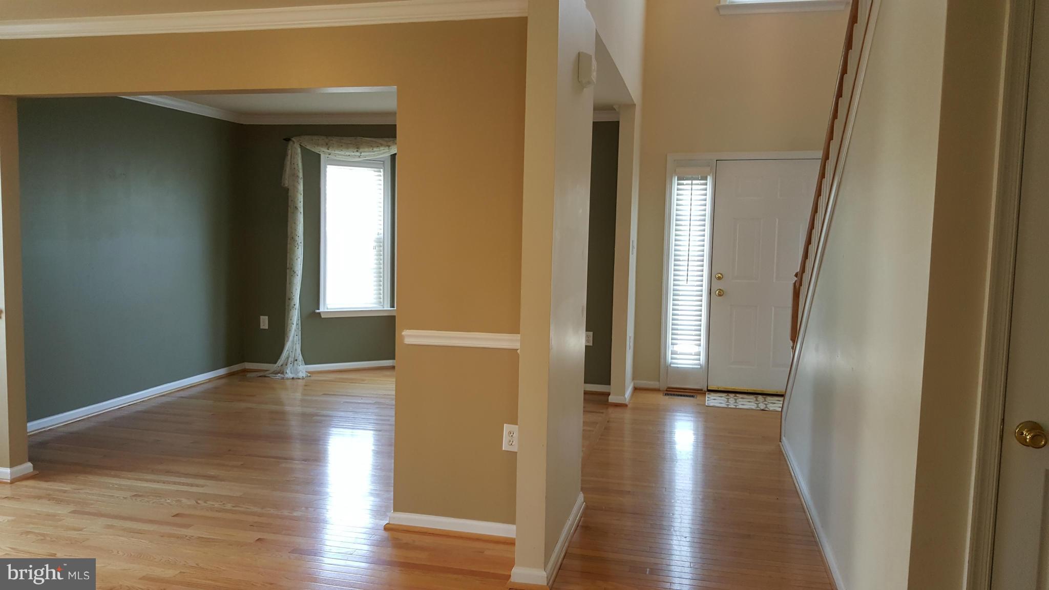 102 Limited Drive Ranson, WV 25438 - Photo 10 of 23 a view of hallway with wooden floor
