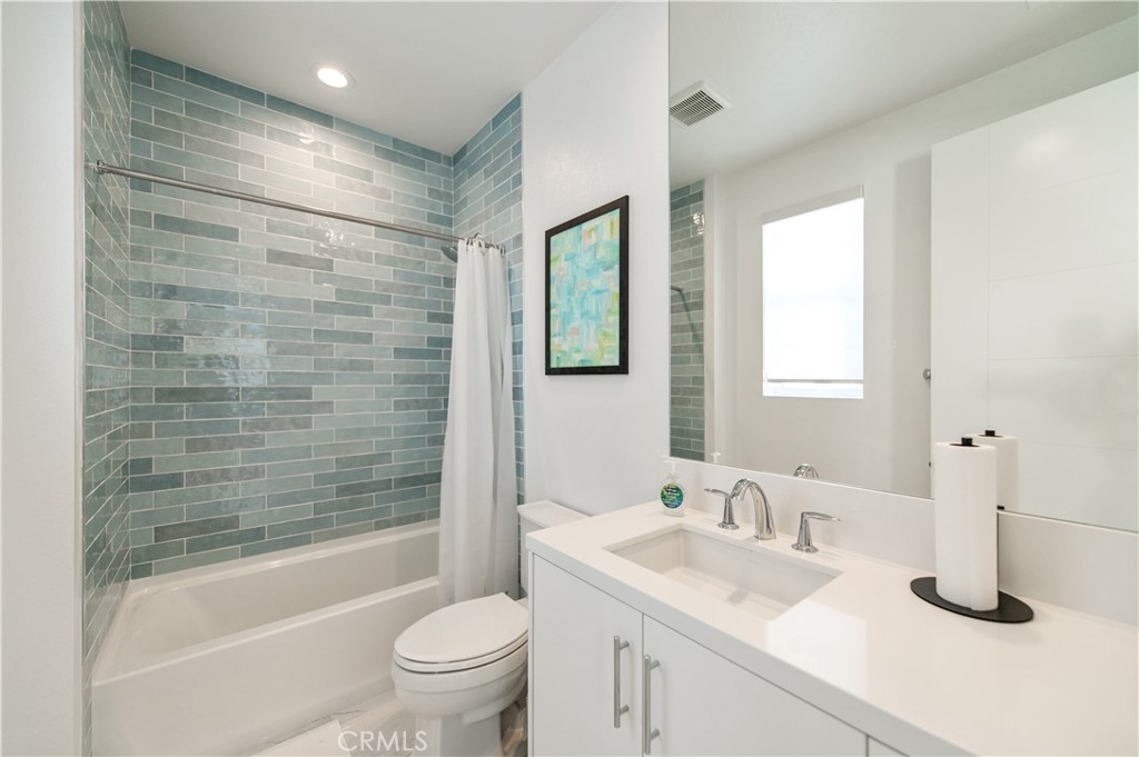 131 Reyes Alley Lake Forest, CA 92630 - Photo 29 of 39 a bathroom with a sink toilet and shower