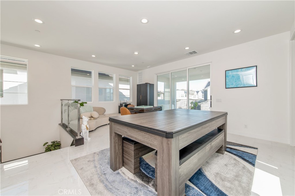 131 Reyes Alley Lake Forest, CA 92630 - Photo 30 of 39 a room with furniture and window