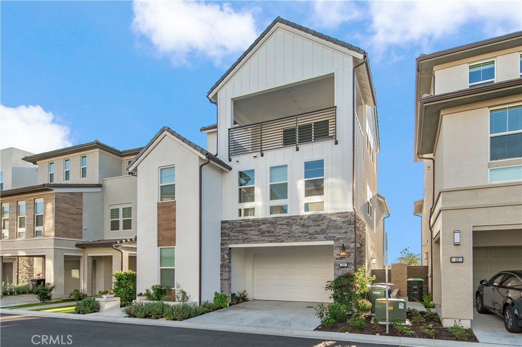 131 Reyes Alley Lake Forest, CA 92630 - Photo 3 of 39 a front view of a residential houses with yard