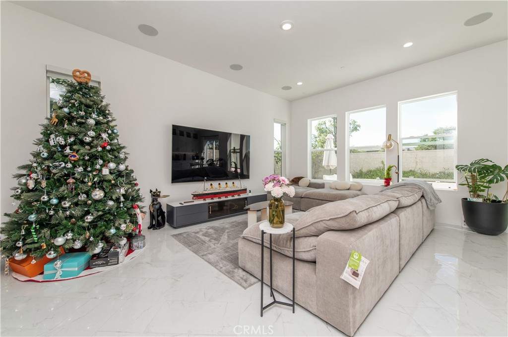 131 Reyes Alley Lake Forest, CA 92630 - Photo 6 of 39 a living room with furniture and a flat screen tv