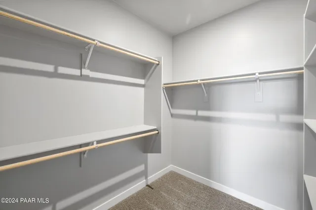 a view of an empty walk in closet