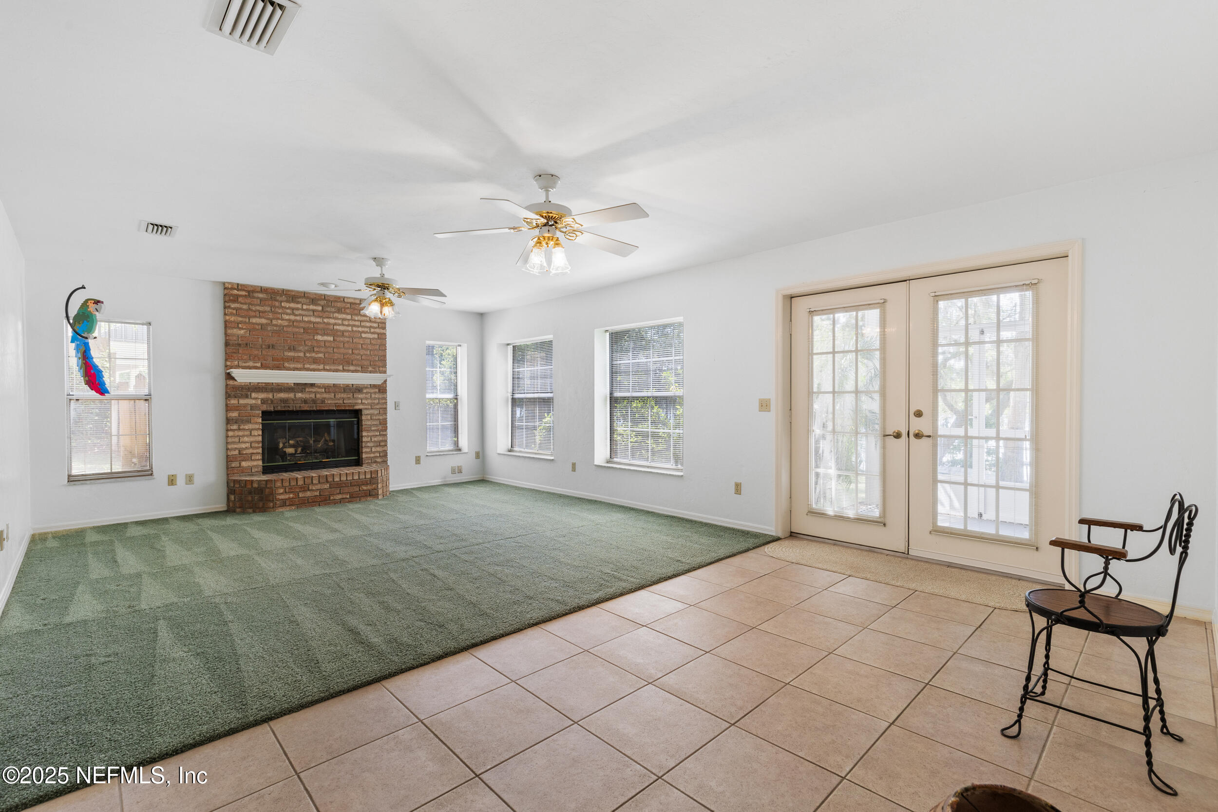 8485 Lilly Lake Road Melrose, FL 32666 - Photo 25 of 44 Downstairs living room