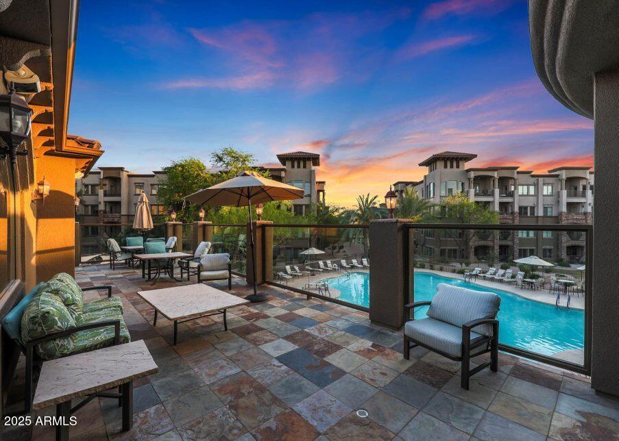 5450 East Deer Valley Drive, Unit 2191 Phoenix, AZ 85054 - Photo 23 of 50 a view of a chairs and table in a patio