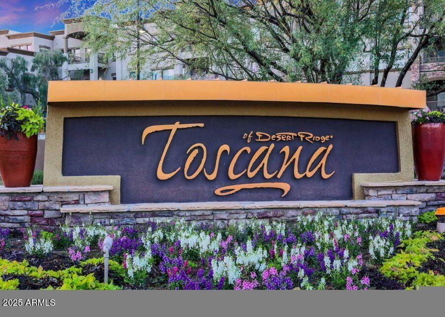 5450 East Deer Valley Drive, Unit 2191 Phoenix, AZ 85054 - Photo 3 of 50 a street sign on a brick wall