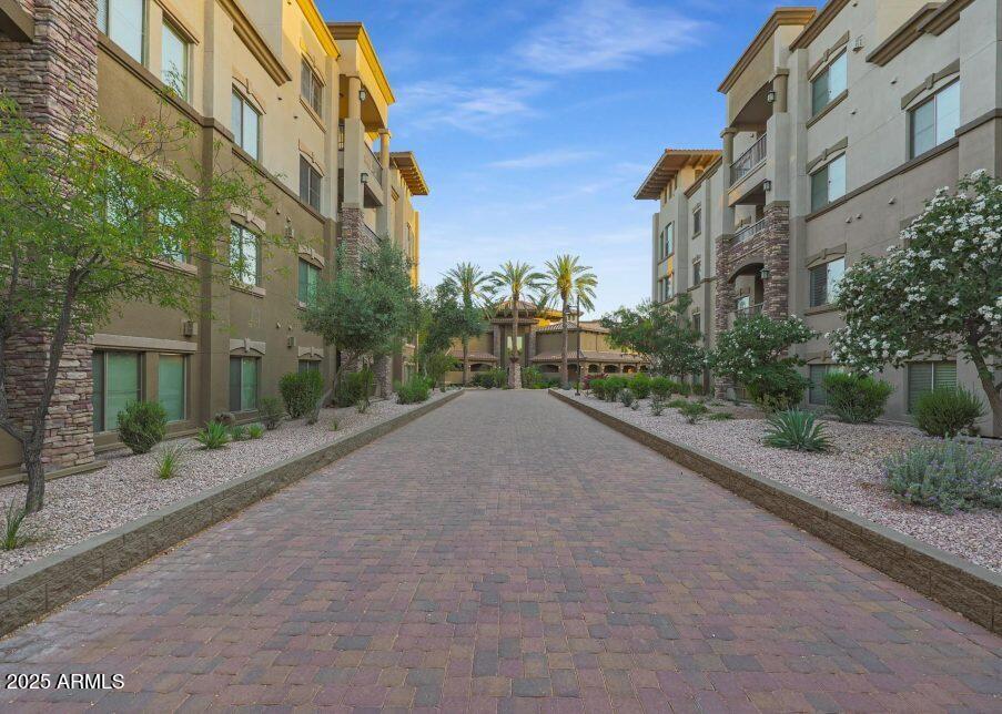 5450 East Deer Valley Drive, Unit 2191 Phoenix, AZ 85054 - Photo 42 of 50 a view of a street with a building in the background