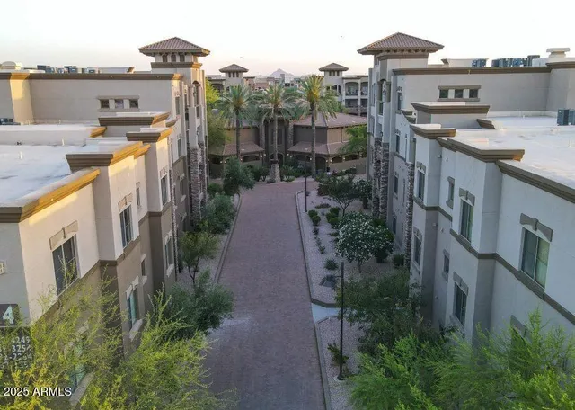 a view of a house with a backyard and balcony