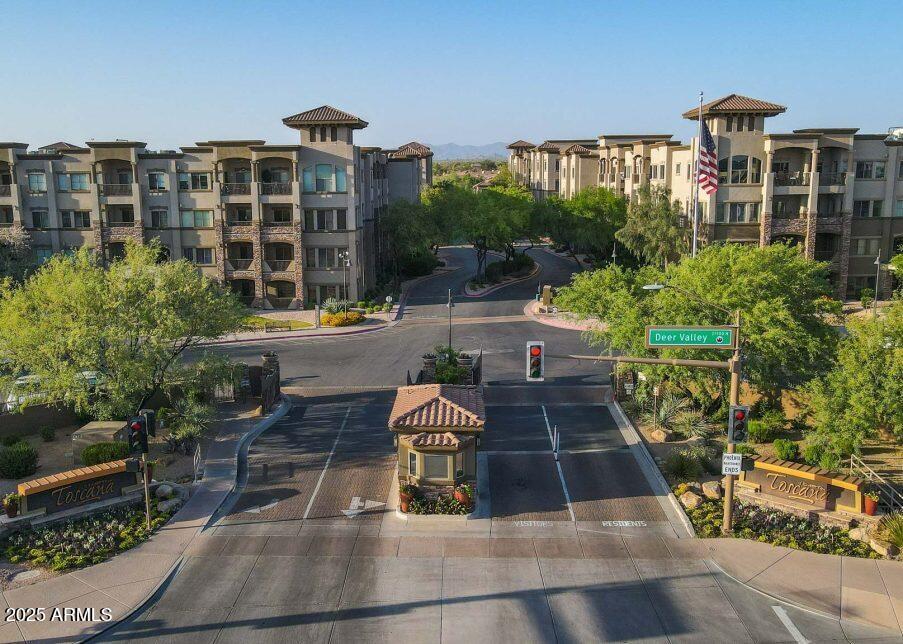5450 East Deer Valley Drive, Unit 2191 Phoenix, AZ 85054 - Photo 47 of 50 a view of a patio with couches table and chairs and potted plants