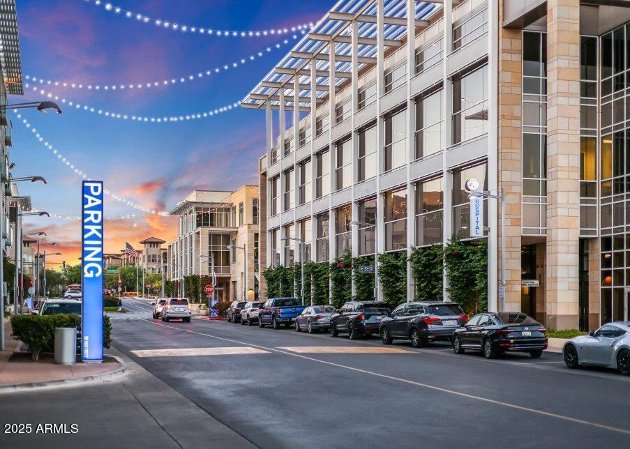 5450 East Deer Valley Drive, Unit 2191 Phoenix, AZ 85054 - Photo 49 of 50 a car parked in front of a building