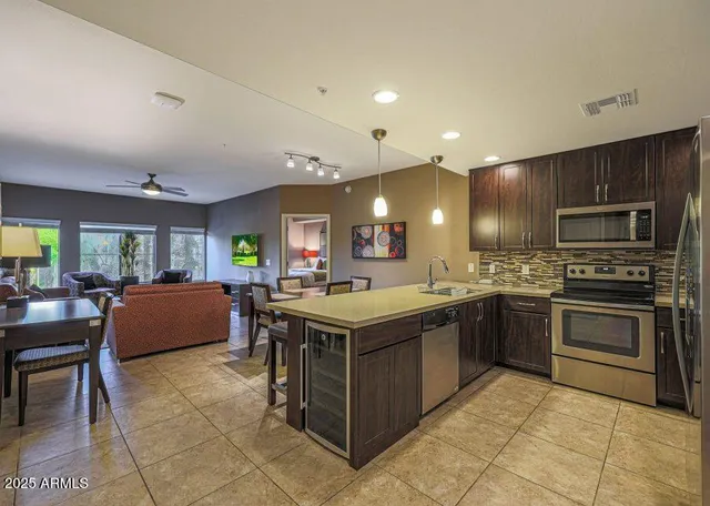 a kitchen with kitchen island granite countertop lots of counter top space