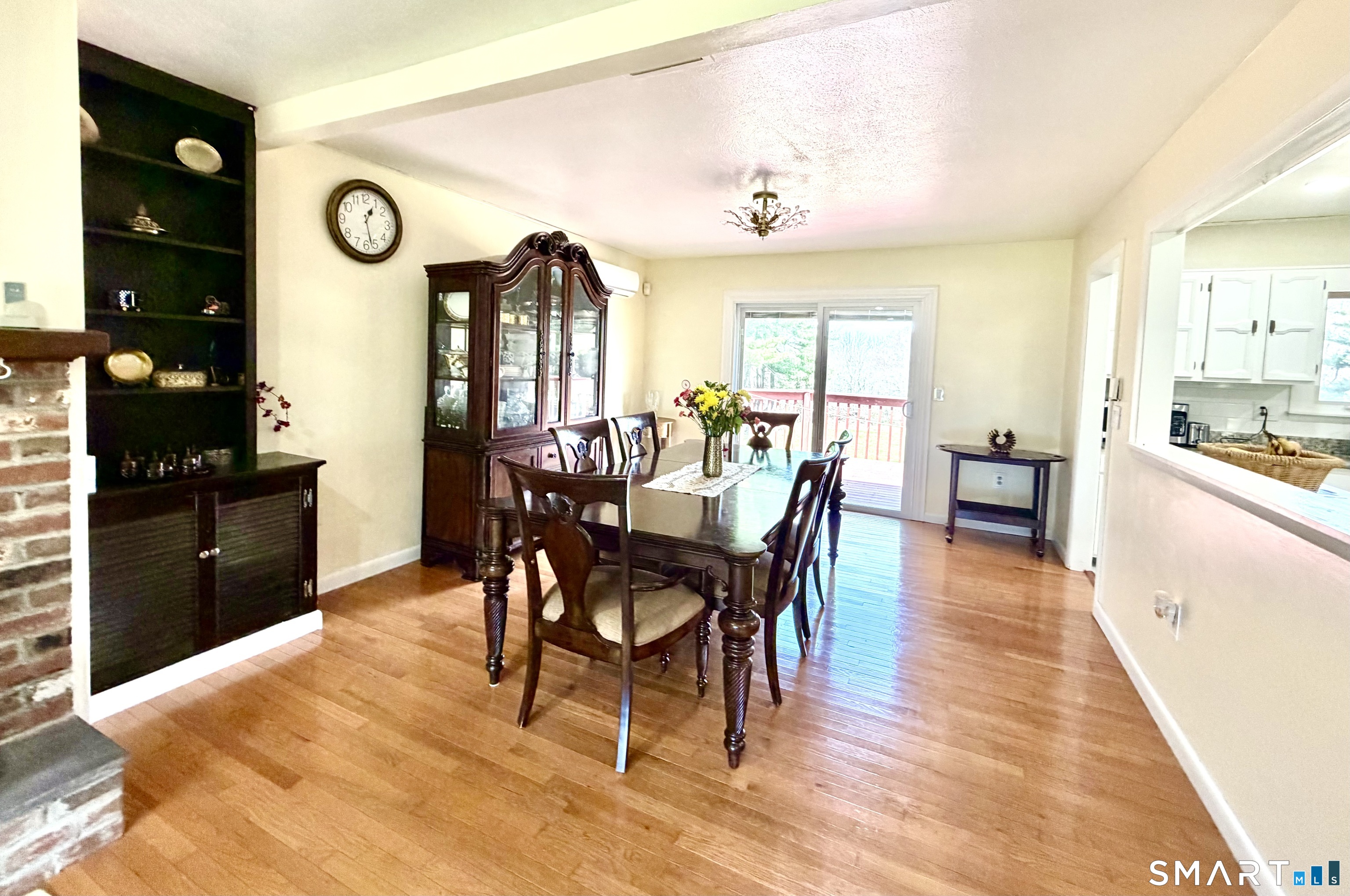 277 Windsorville Road Ellington, CT 06029 - Photo 11 of 40 a view of a dining room with furniture and wooden floor