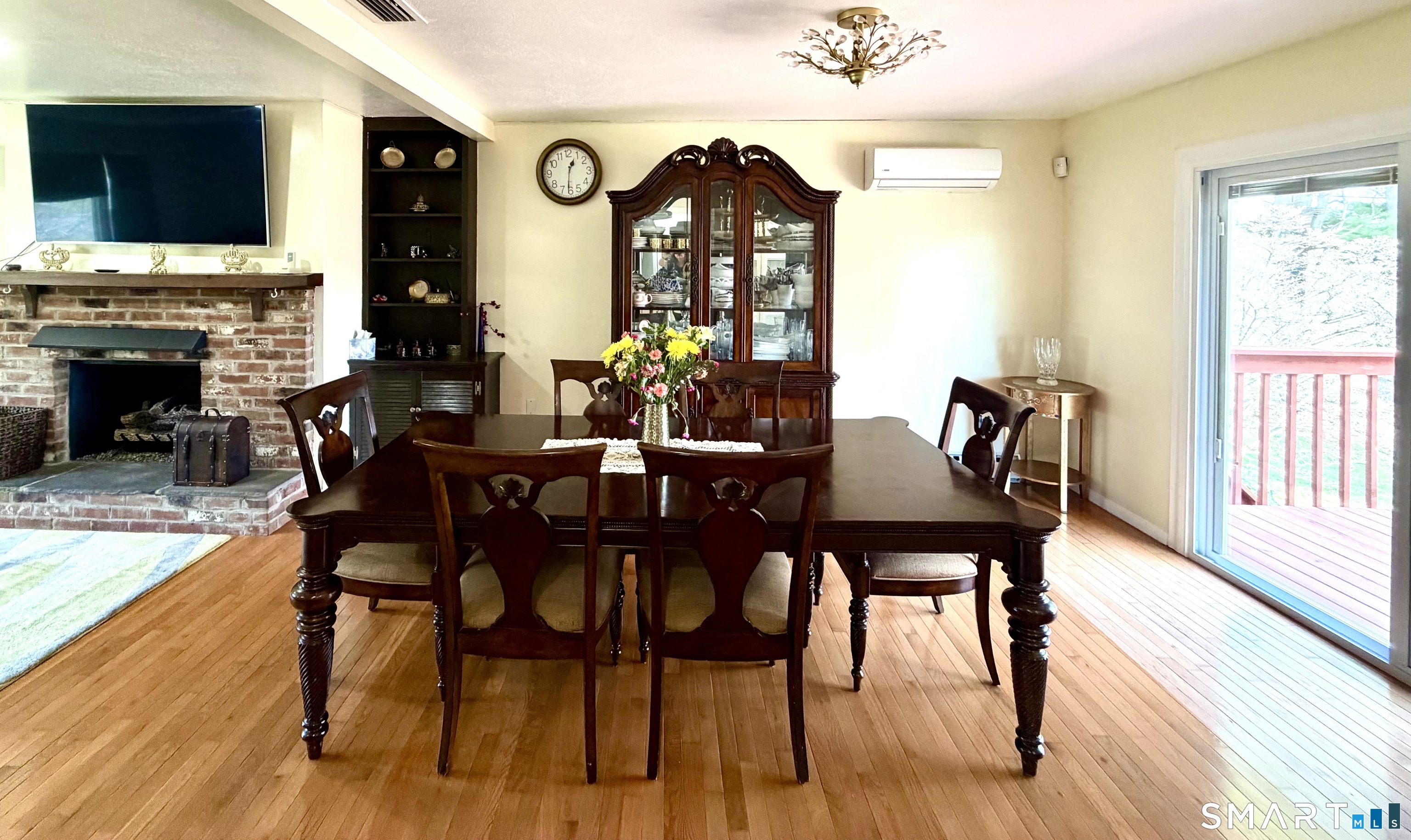 277 Windsorville Road Ellington, CT 06029 - Photo 12 of 40 a view of a dining room with furniture and wooden floor