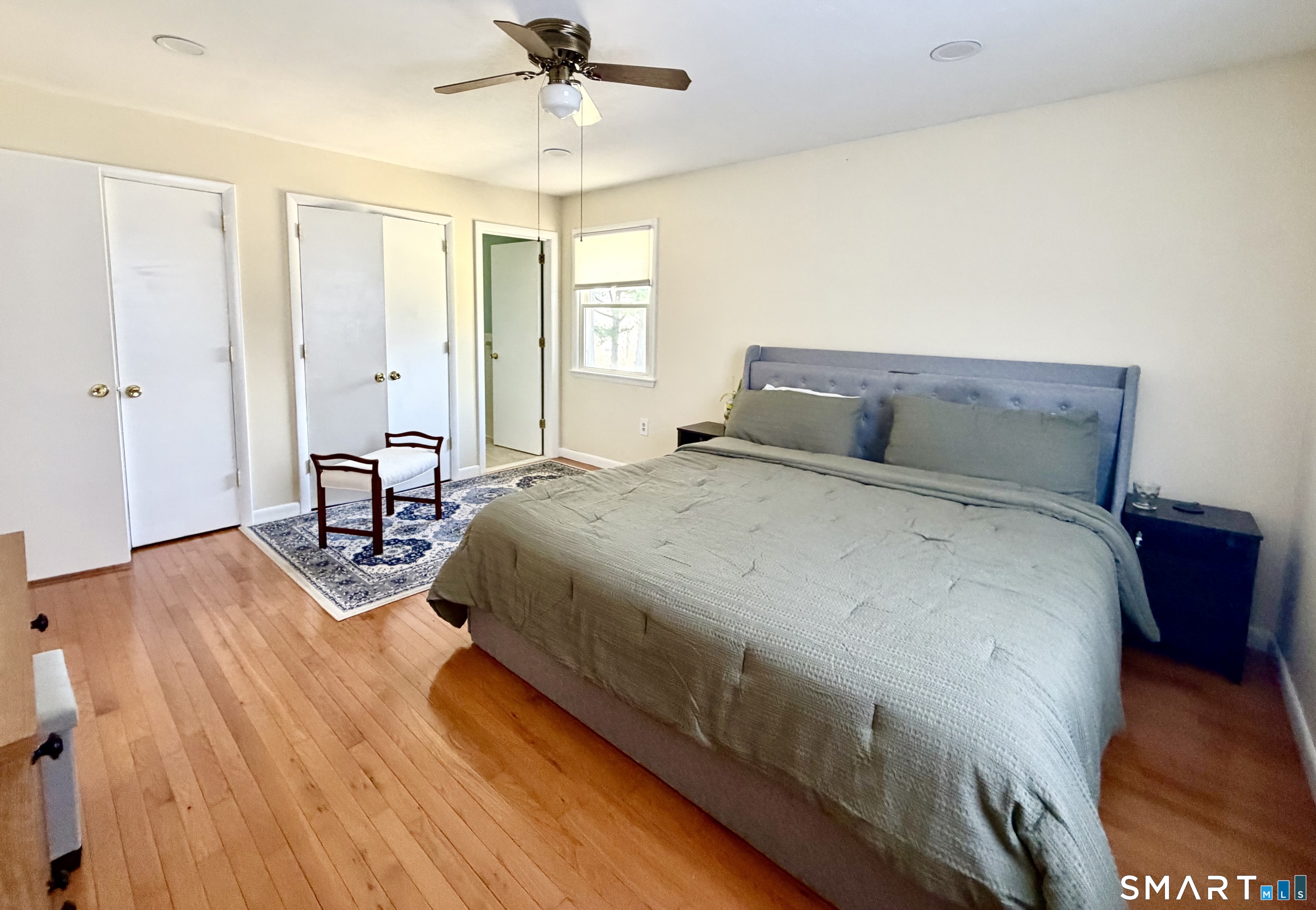 277 Windsorville Road Ellington, CT 06029 - Photo 18 of 40 a bed sitting in a spacious bedroom next to a window