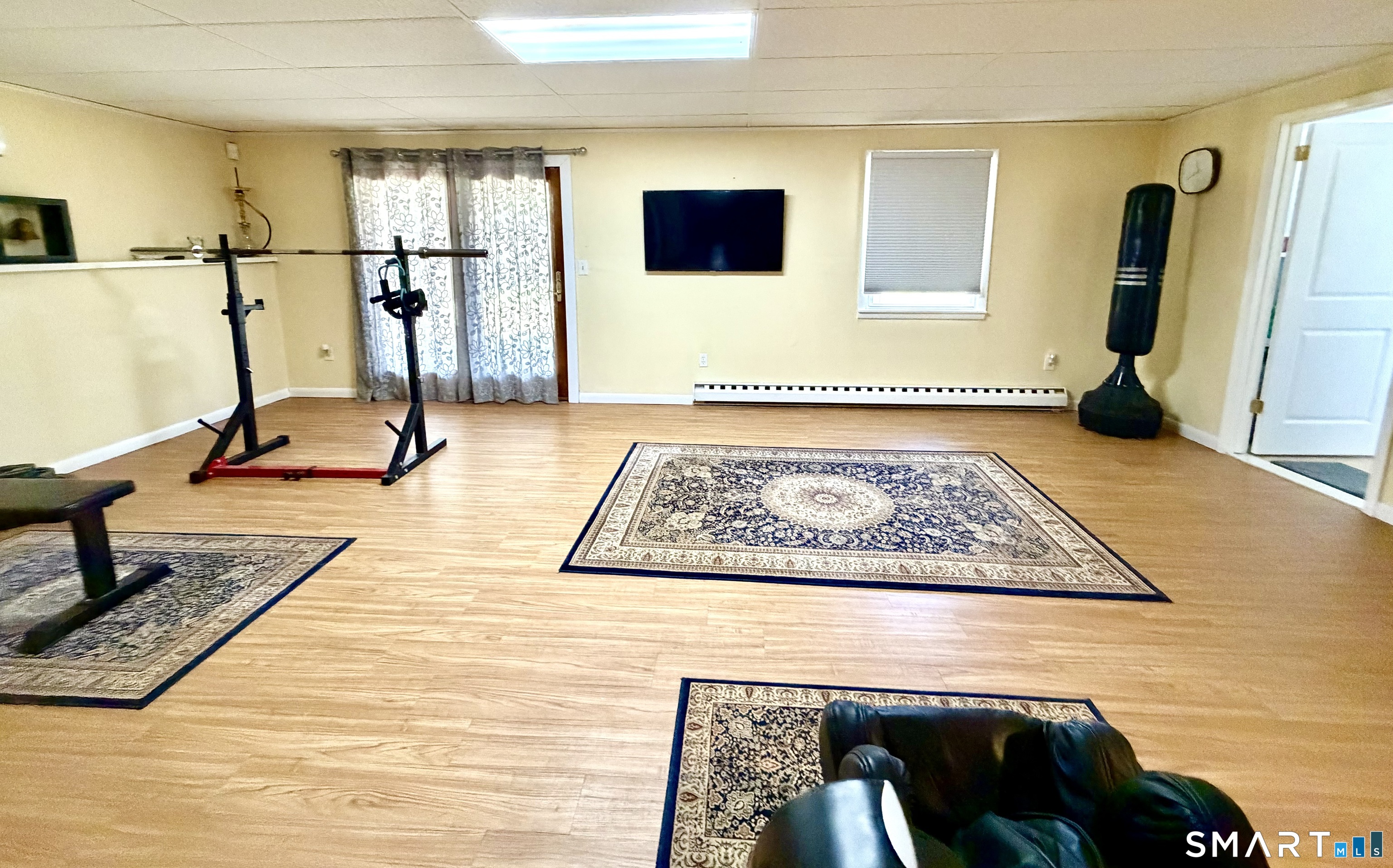 277 Windsorville Road Ellington, CT 06029 - Photo 29 of 40 a view of living room with furniture and a rug