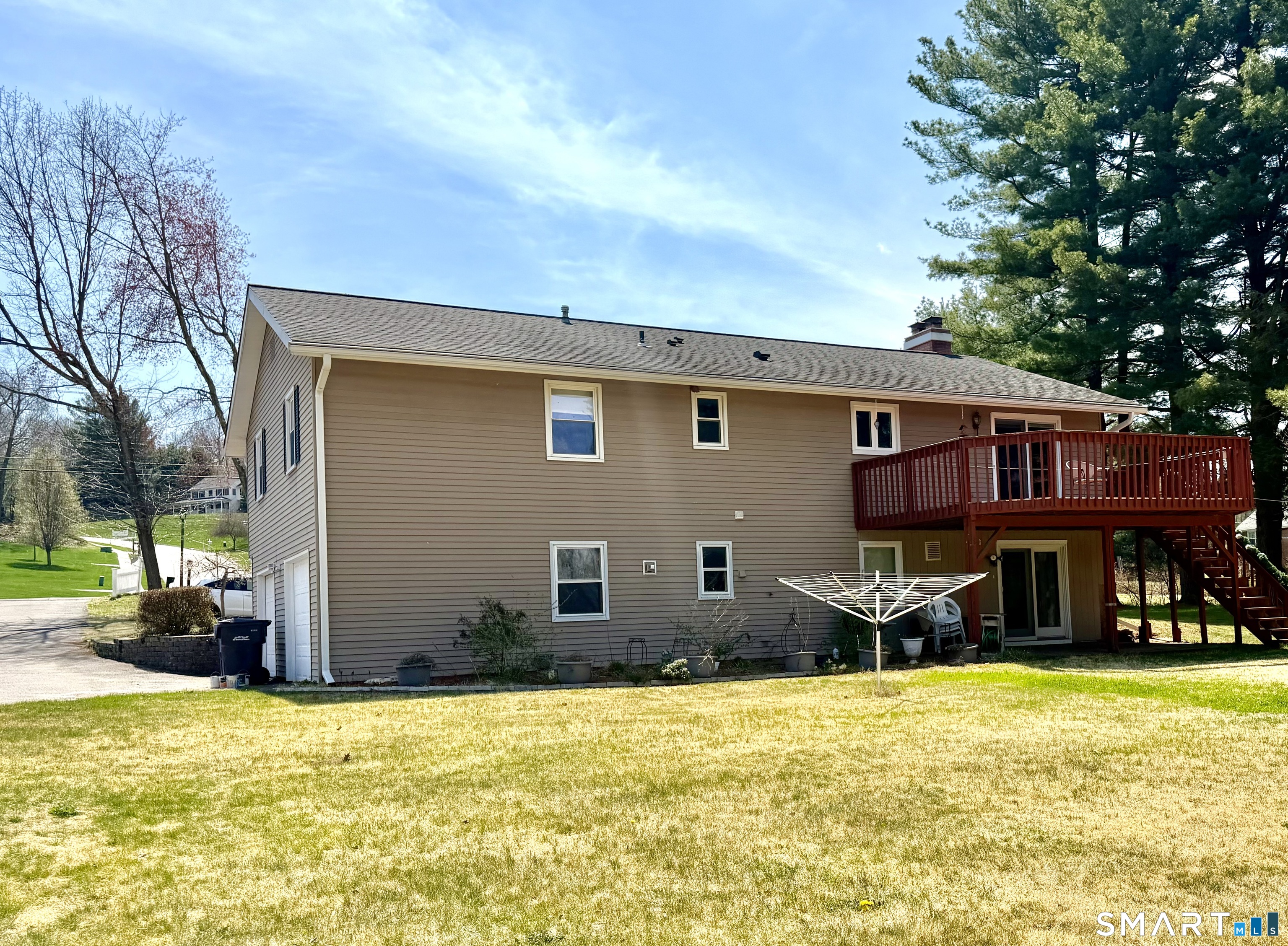 277 Windsorville Road Ellington, CT 06029 - Photo 35 of 40 a view of a house with a patio