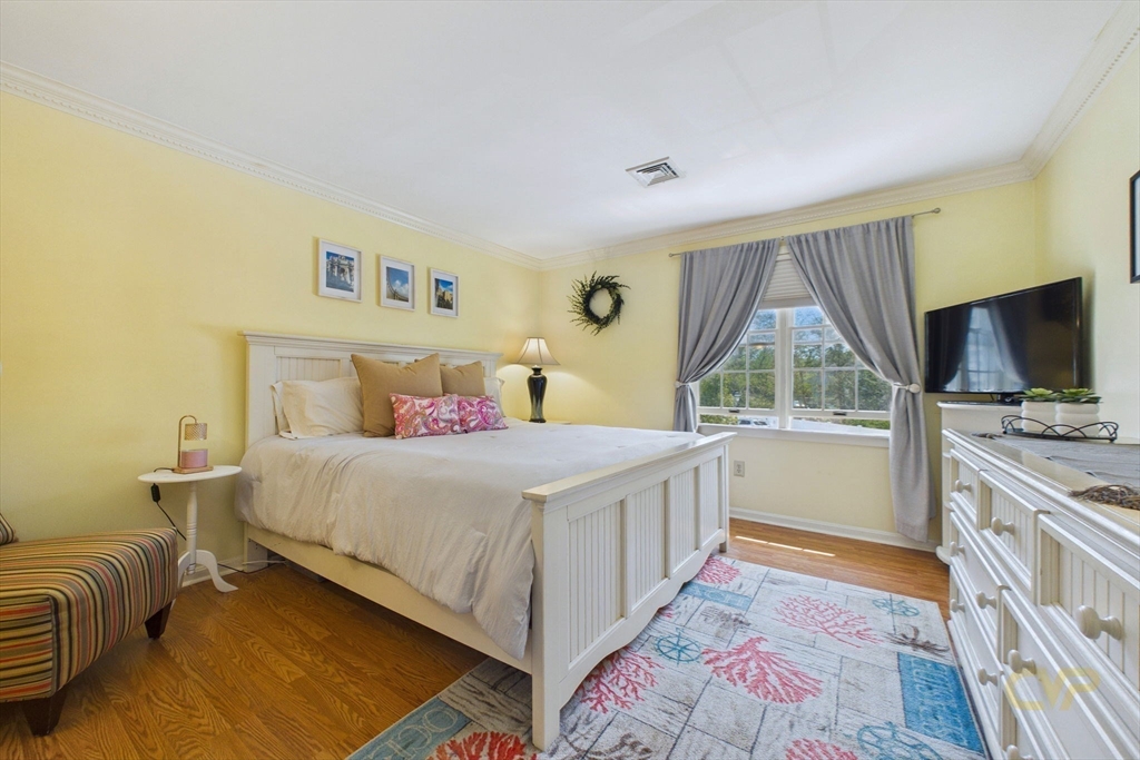 700 Shore Drive, Unit 509 Fall River, MA 02721 - Photo 13 of 25 a bedroom with a bed and a flat screen tv