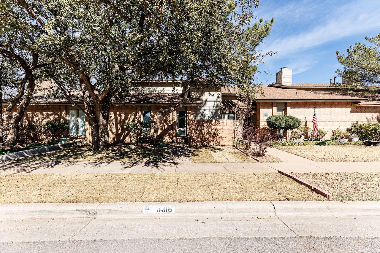 3316 79th Street Lubbock, TX 79423 - Photo 1 of 45 a view of a backyard of the house