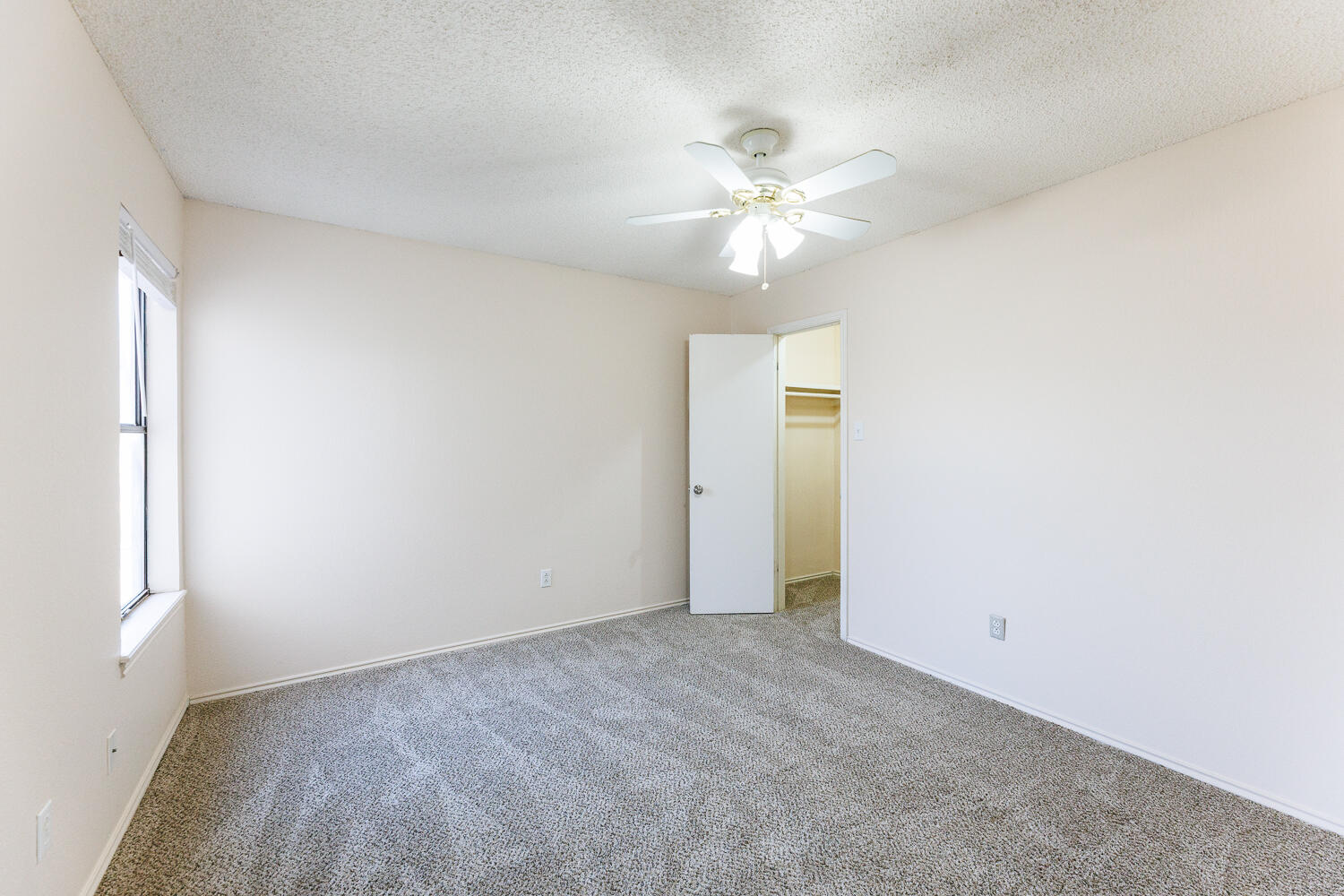3316 79th Street Lubbock, TX 79423 - Photo 36 of 45 a view of an empty room with a window
