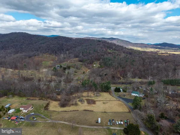 a view of a lake with mountains in the background