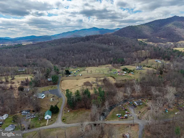 a view of a road with an ocean