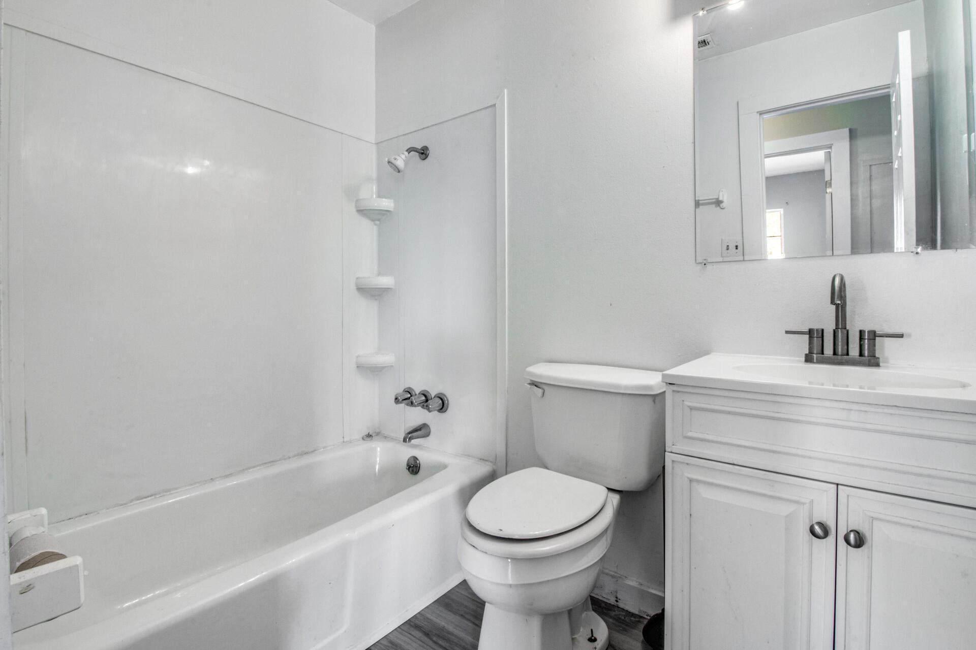 697 Long Drive Crestview, FL 32539 - Photo 20 of 26 a bathroom with a sink toilet and shower