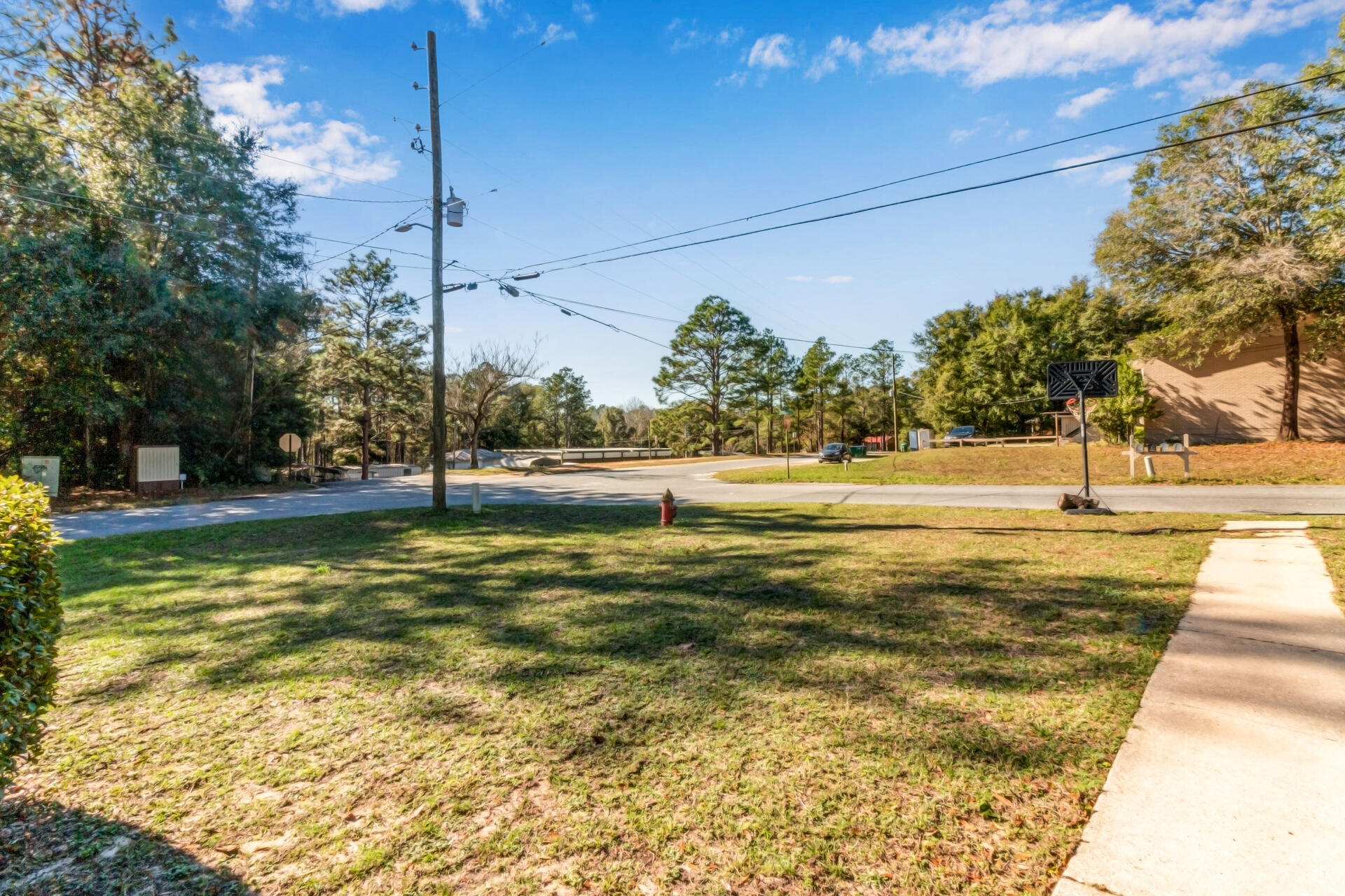 697 Long Drive Crestview, FL 32539 - Photo 26 of 26 a view of a yard with swimming pool