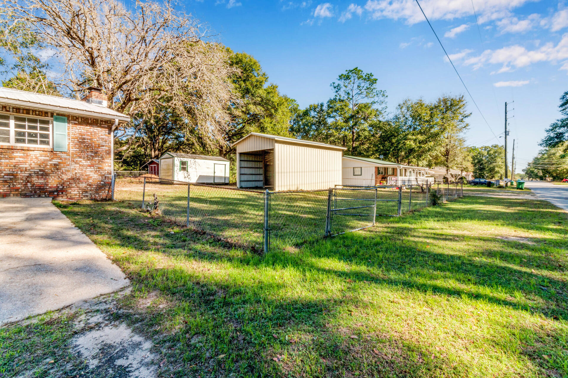 697 Long Drive Crestview, FL 32539 - Photo 4 of 26 a view of a house with a yard