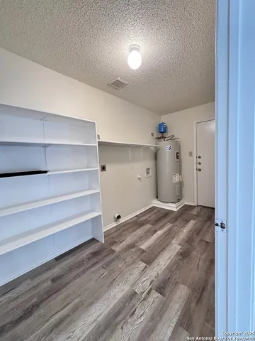 a view of entryway with wooden floor