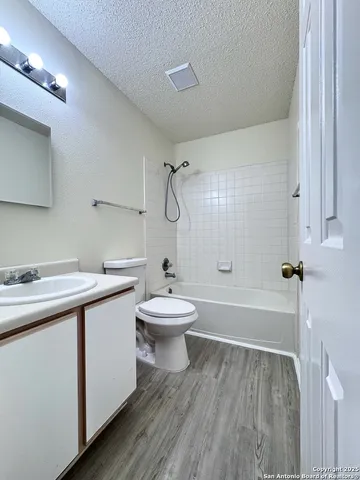 a bathroom with a sink and a bathtub