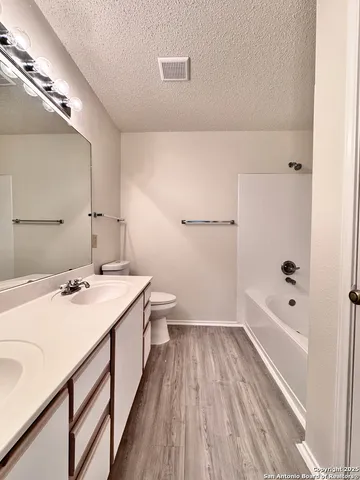 a bathroom with a bathtub