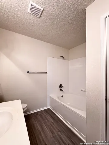 a view of outdoor space with deck and yard