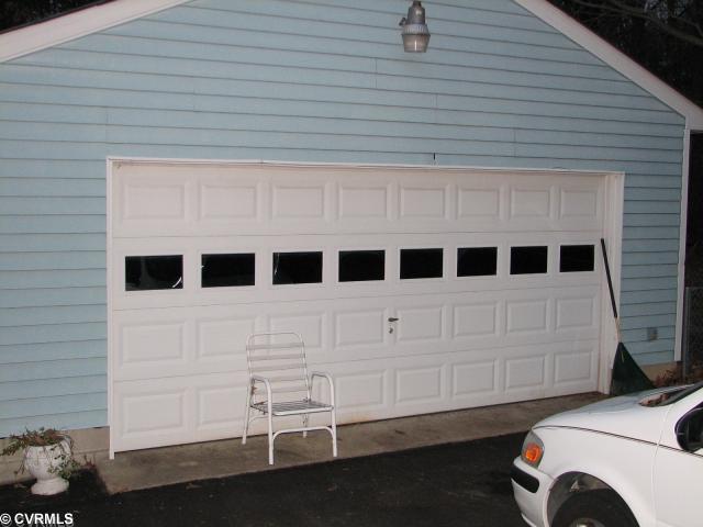 2108 Old Bermuda Hundred Road Chester, VA 23836 - Photo 4 of 4 Parking Lot/Garage - Large 2-car garage with alarm system - also has heat and air conditioning