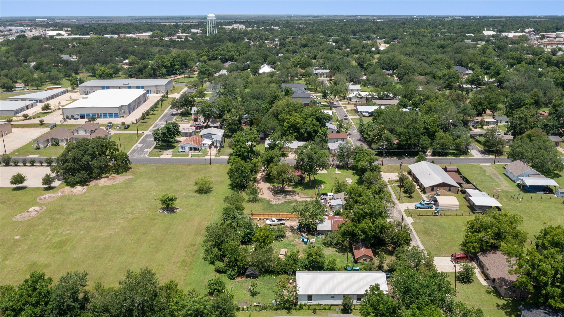 503 West Alamo Street Elgin, TX 78621 - Photo 8 of 11 an aerial view of residential houses with outdoor space and trees