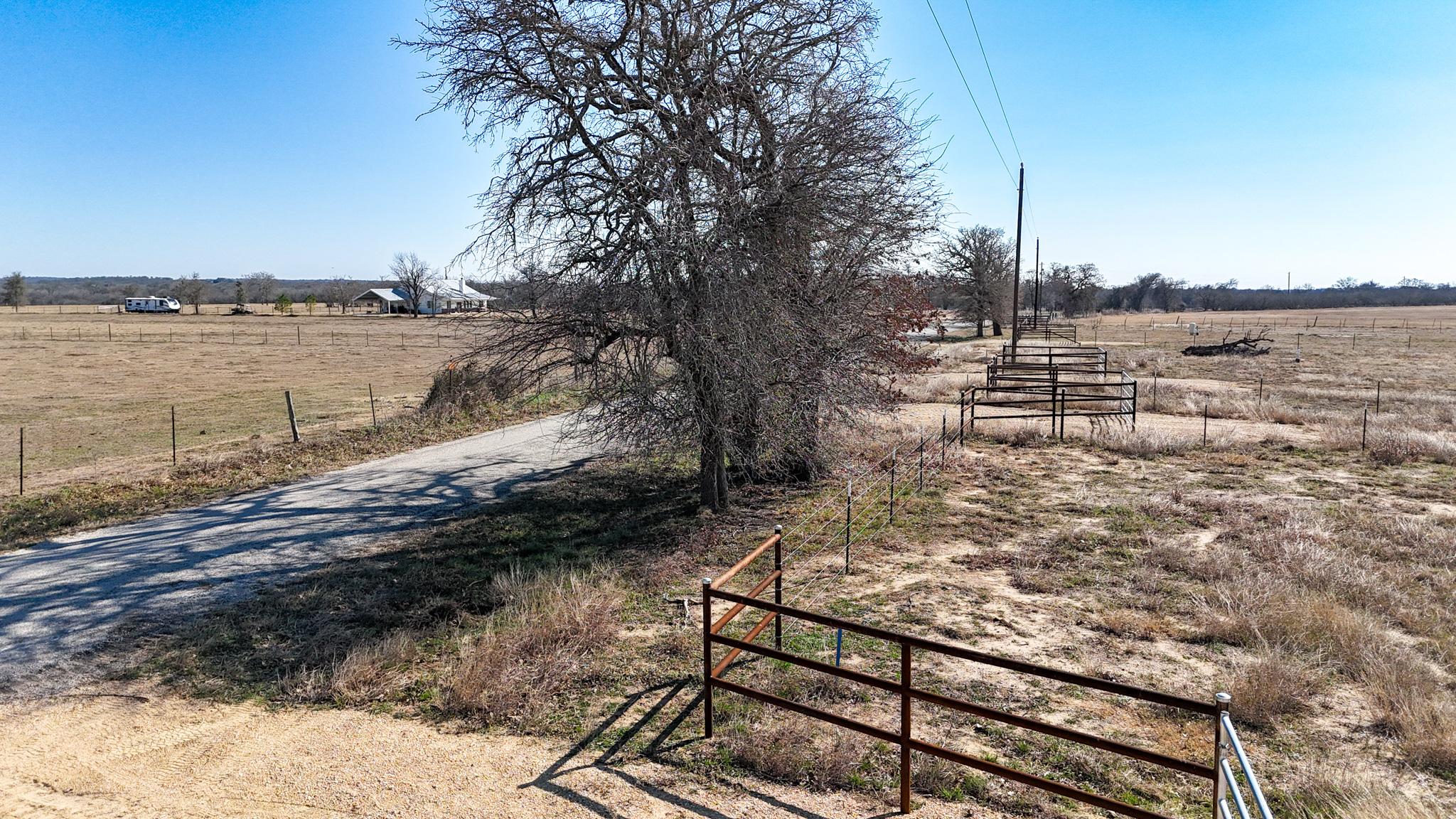 8200 Old Colony Line Road Dale, TX 78616 - Photo 7 of 9 a view of a yard with wooden fence