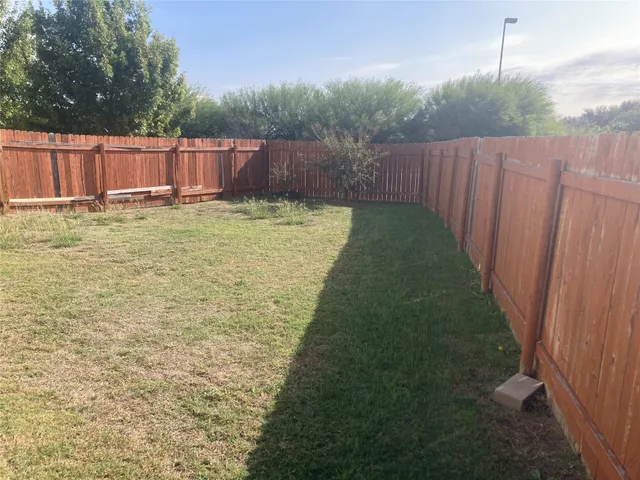 a view of house with a door and wooden floor