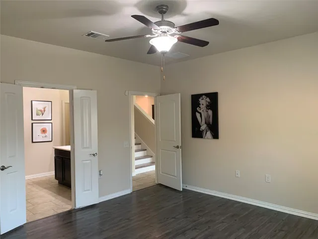 a bathroom with a sink double vanity and a mirror