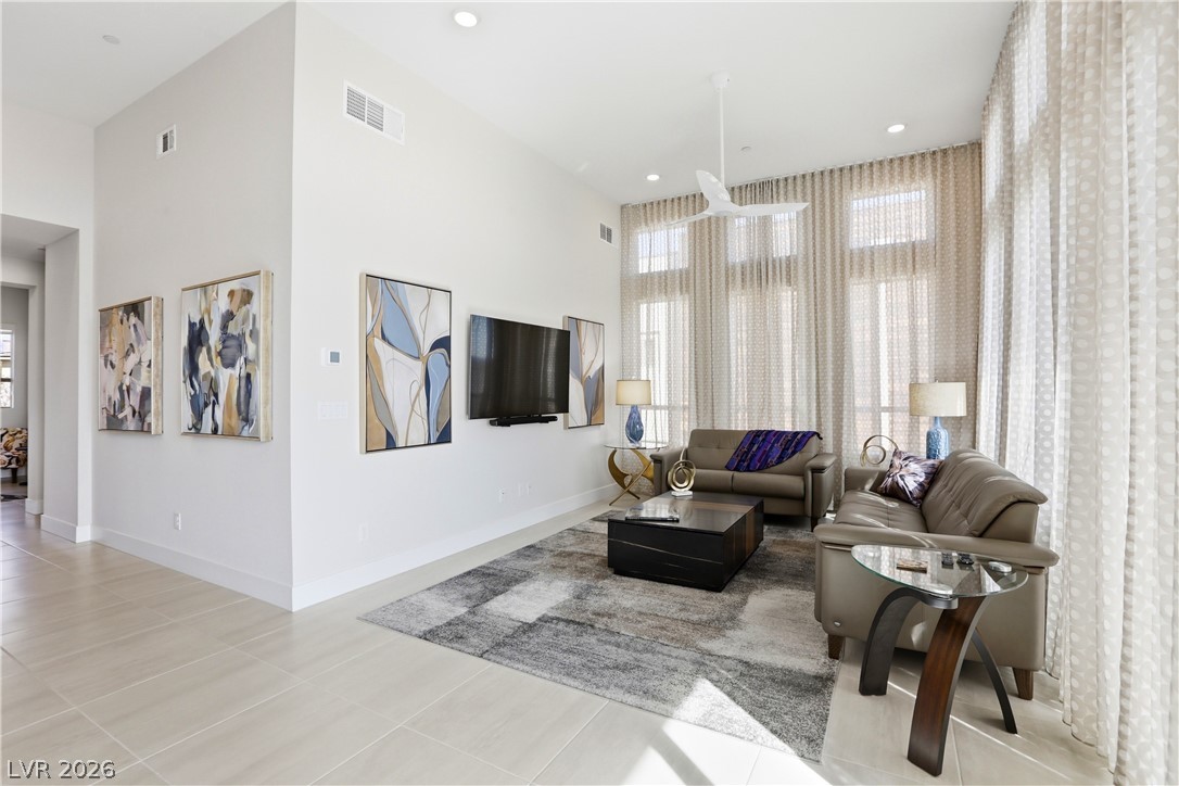 4159 Solace Street, Unit 2 Las Vegas, NV 89135 - Photo 19 of 71 12' ceilings, floor to ceiling drapes. TV stays.