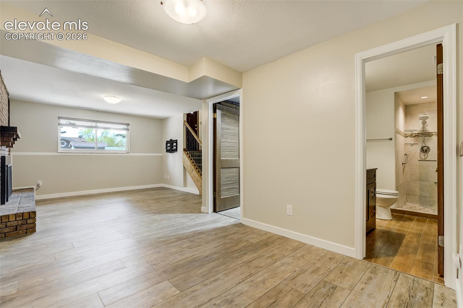 2814 Ridgeglen Place Colorado Springs, CO 80918 - Photo 24 of 50 Family Room in Garden Level Basement with 3/4 Bath